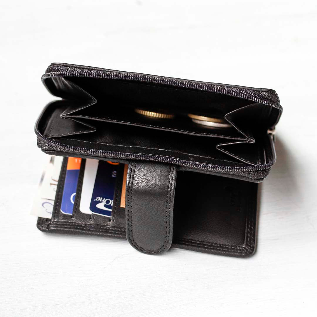 A black leather wallet for women with a zipped coin pocket
