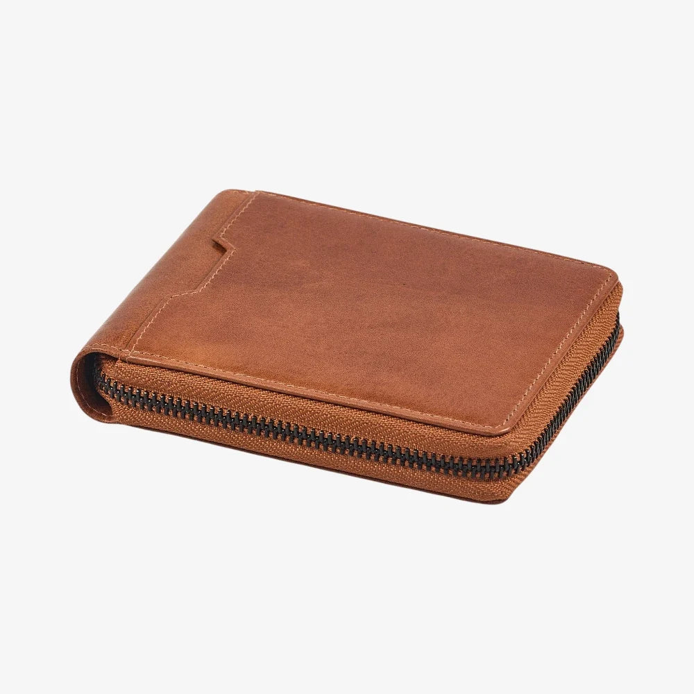 Top view of Tan leather wallet with a zipper on a white background