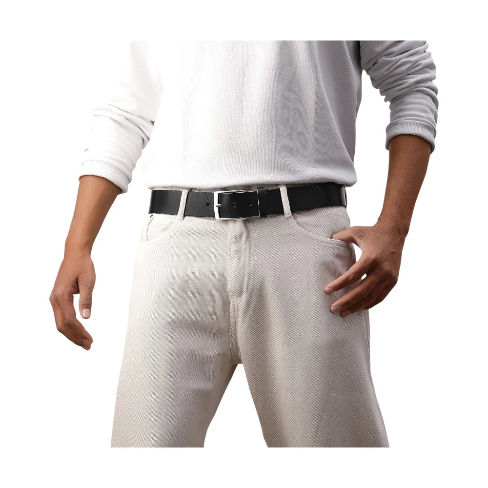 Person wearing a white shirt, light-colored pants, and a black belt on a white background