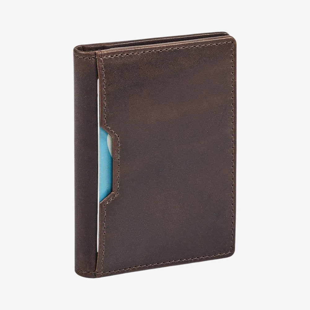 Brown leather credit card holder with a blue card pocket on a white background