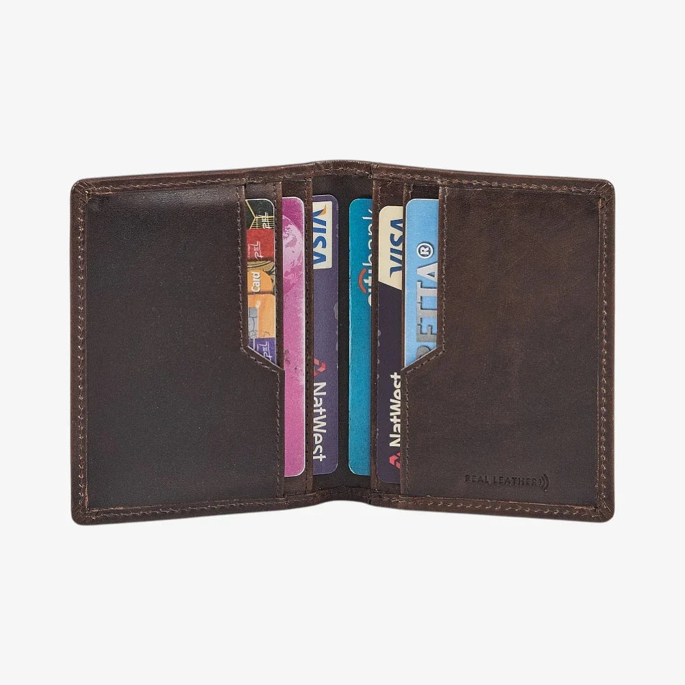 Brown leather credit card holder with multiple cards inside on a white background