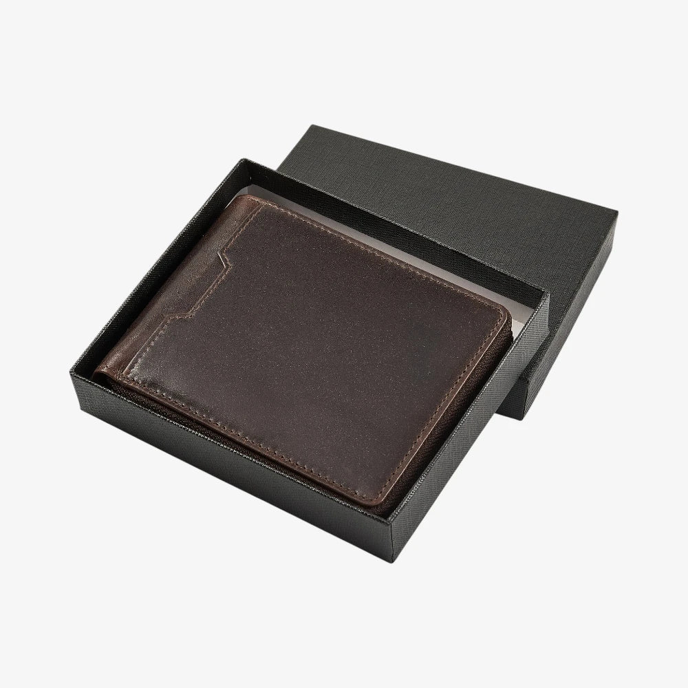 Brown leather wallet in an open black box on a white background