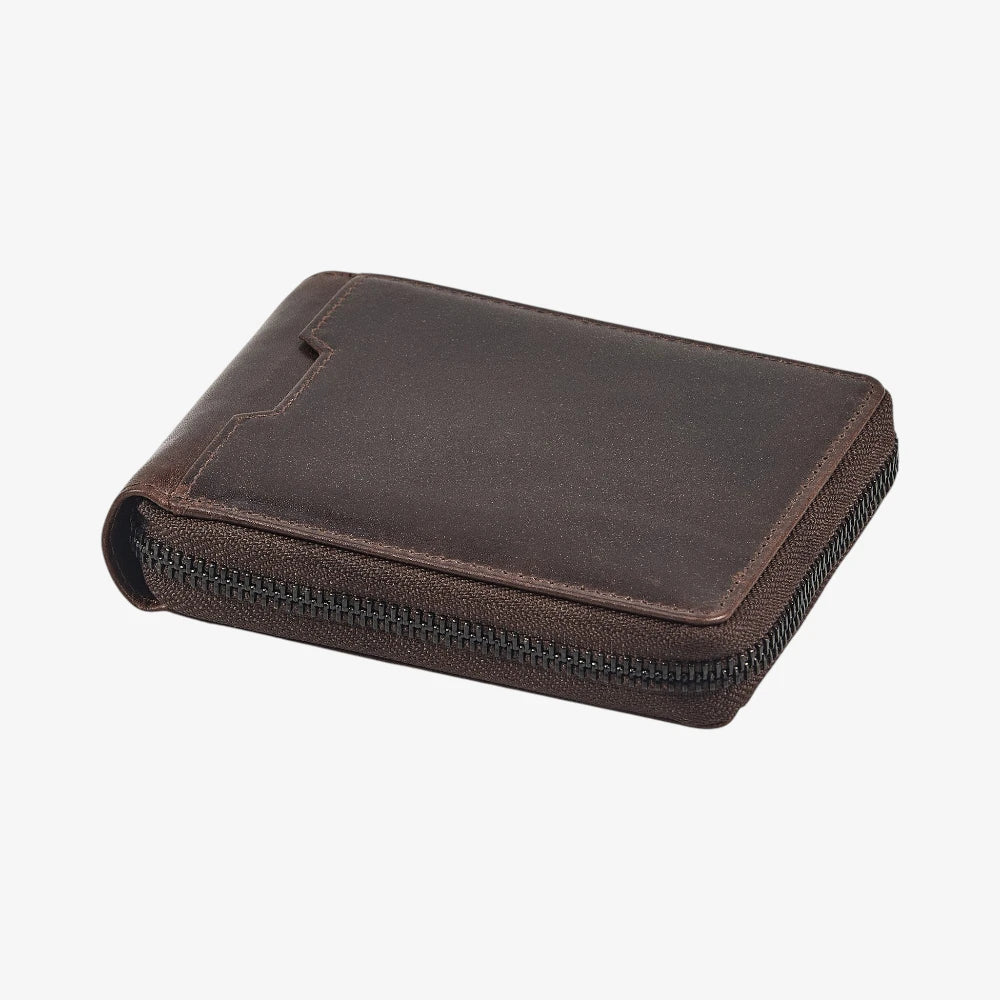 Top view of Brown leather zippered case on a white background