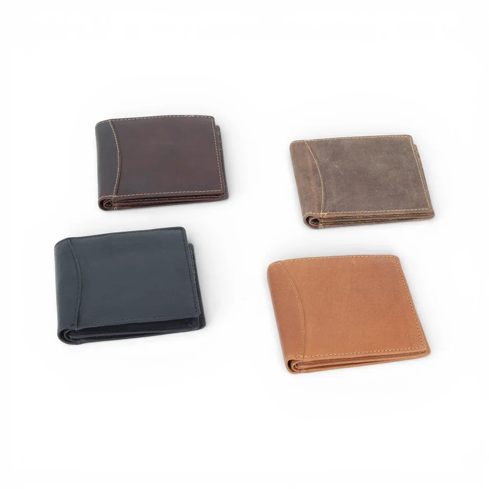 Four leather wallets in different colours on a white background