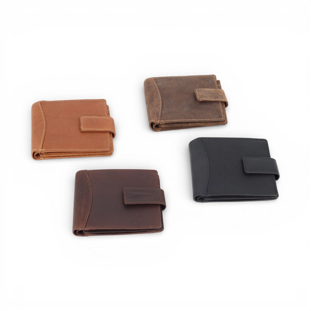 Four leather wallets in different colours on a white background