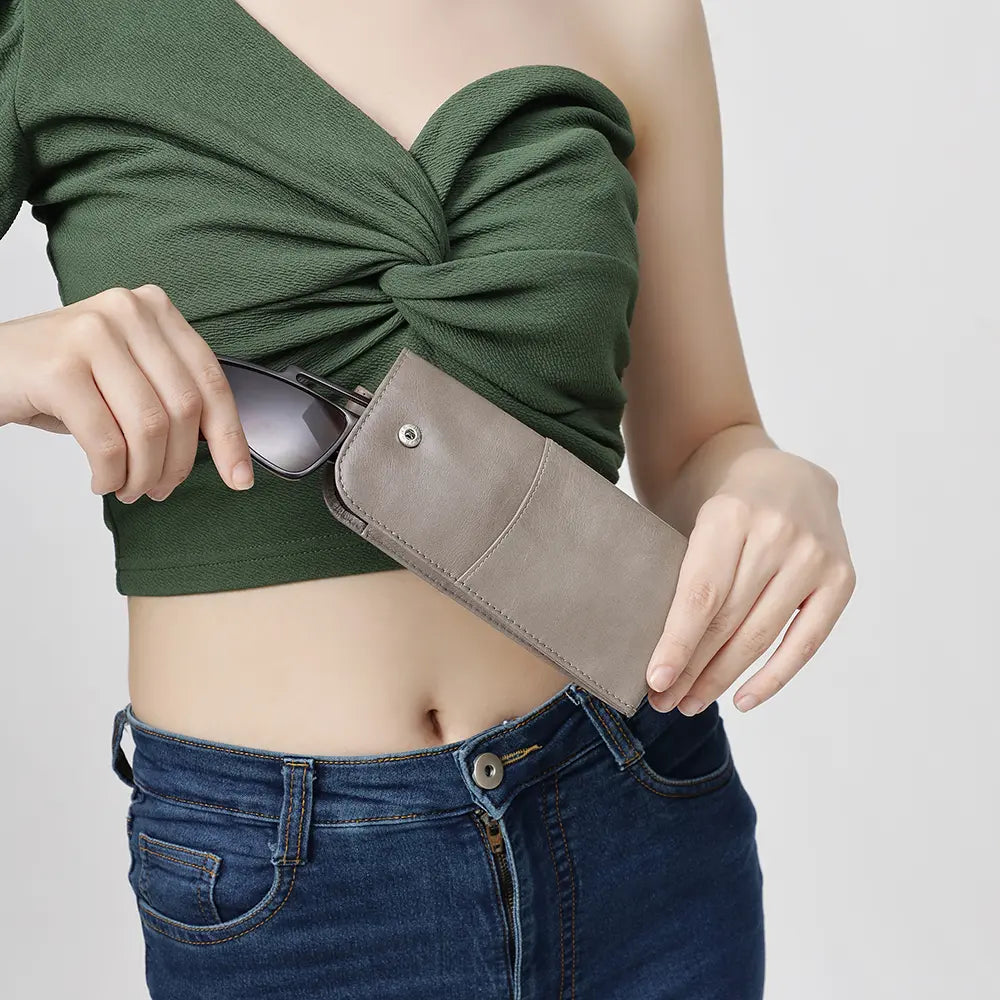 Person holding Grey Leather Glasses Case