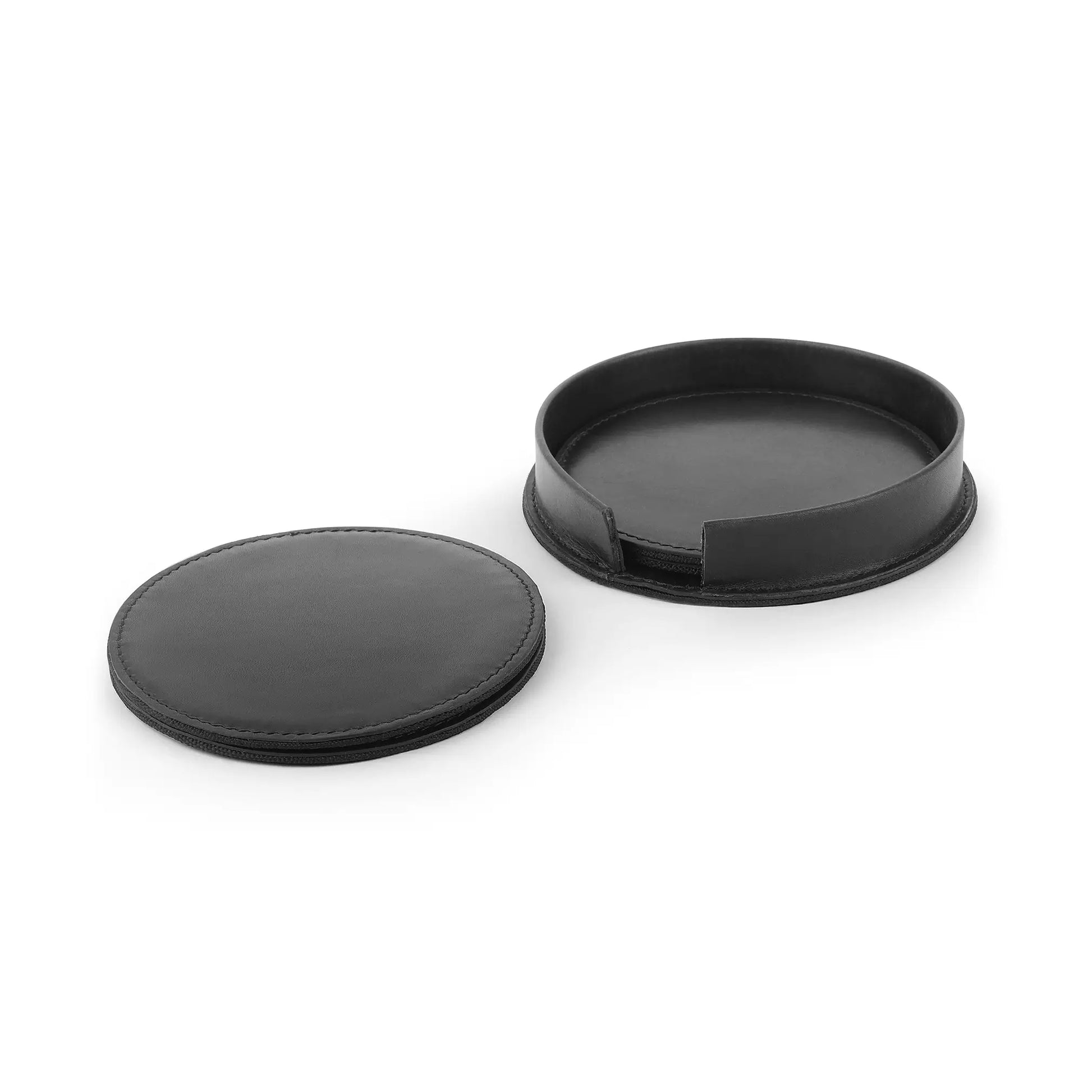 Two black leather coaster  on a white background