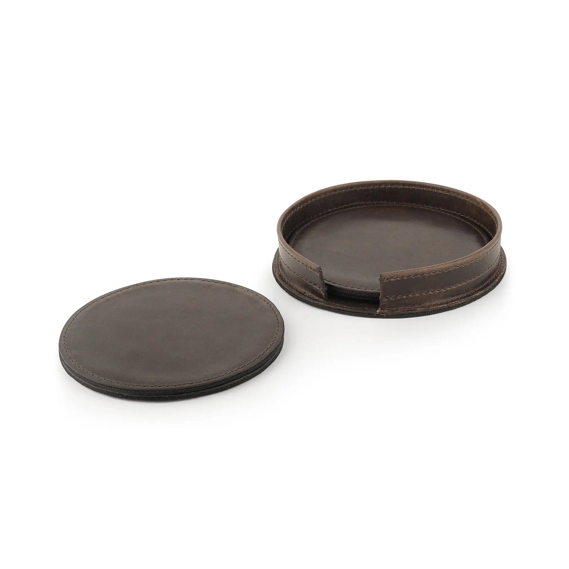 Two brown leather coasters on a white background