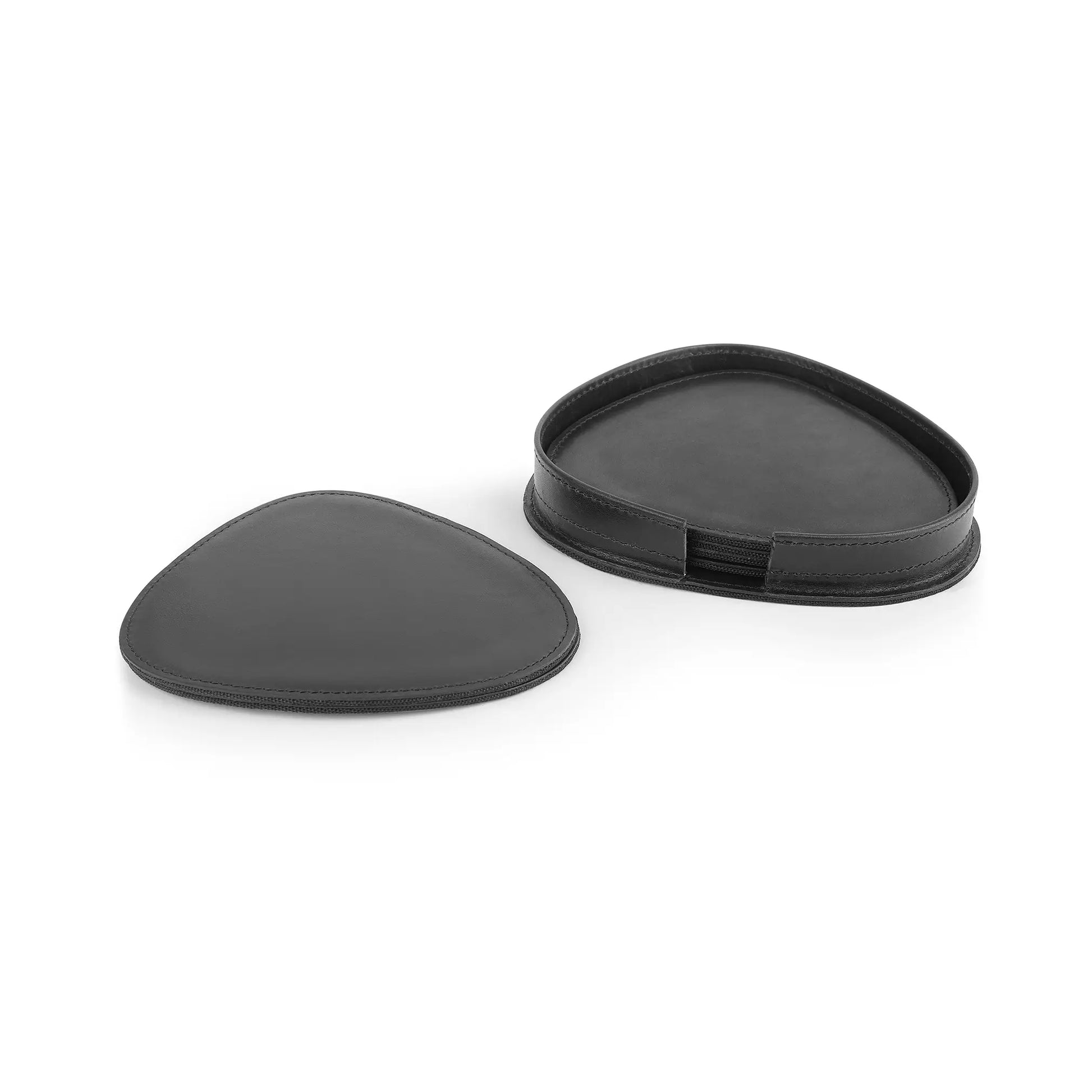 Two black leather coaster  on a white background