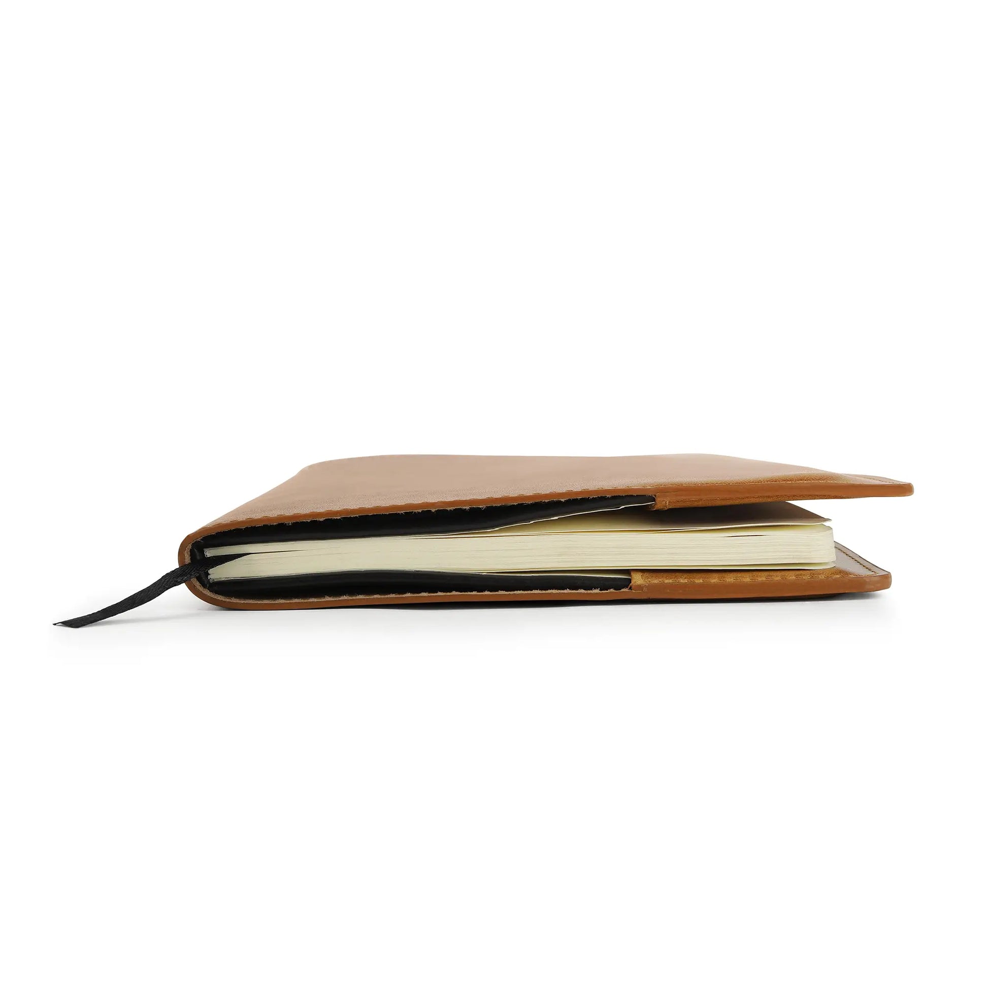 Tan leather diary cover on a white background