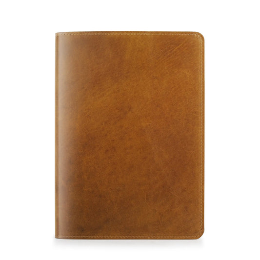 Tan leather diary cover on a white background