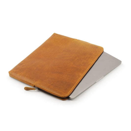 Tan leather laptop sleeve on a white background