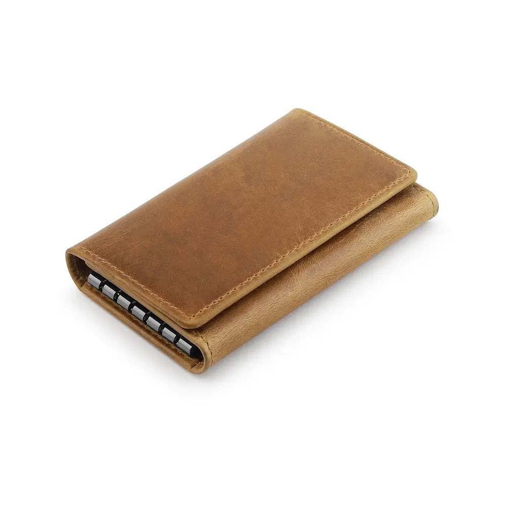 Tan leather wallet on a white background