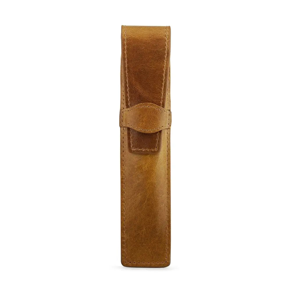Tan leather pen holder on a white background