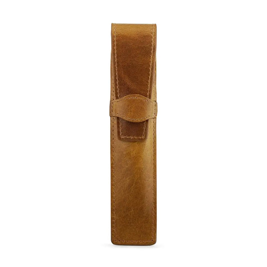 Tan leather pen holder on a white background