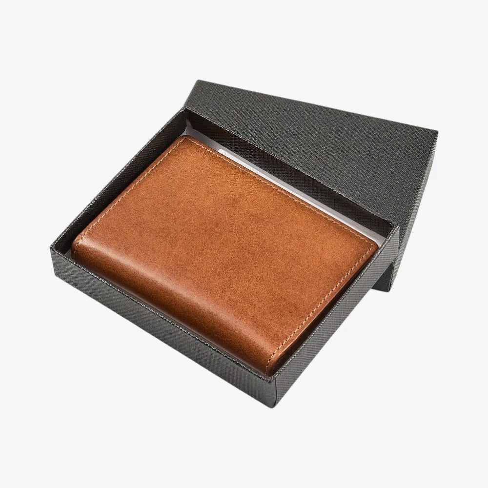 Tan  leather credit card holderin a black box on a white background