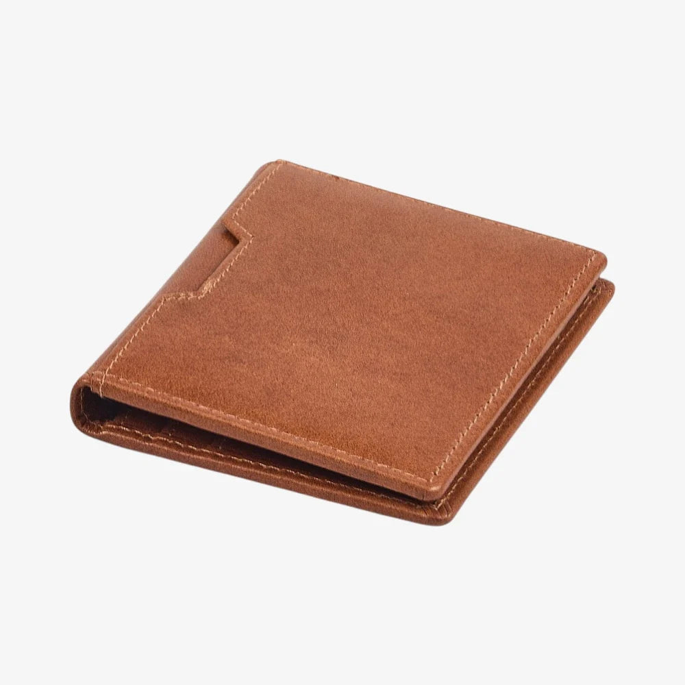Top view of Tan leather credit card holder on a white background