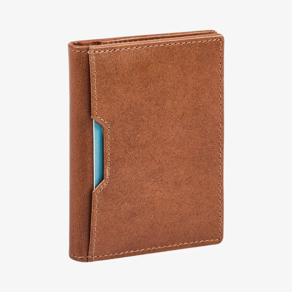 Tan leather credit card holderwith a card pocket on a white background