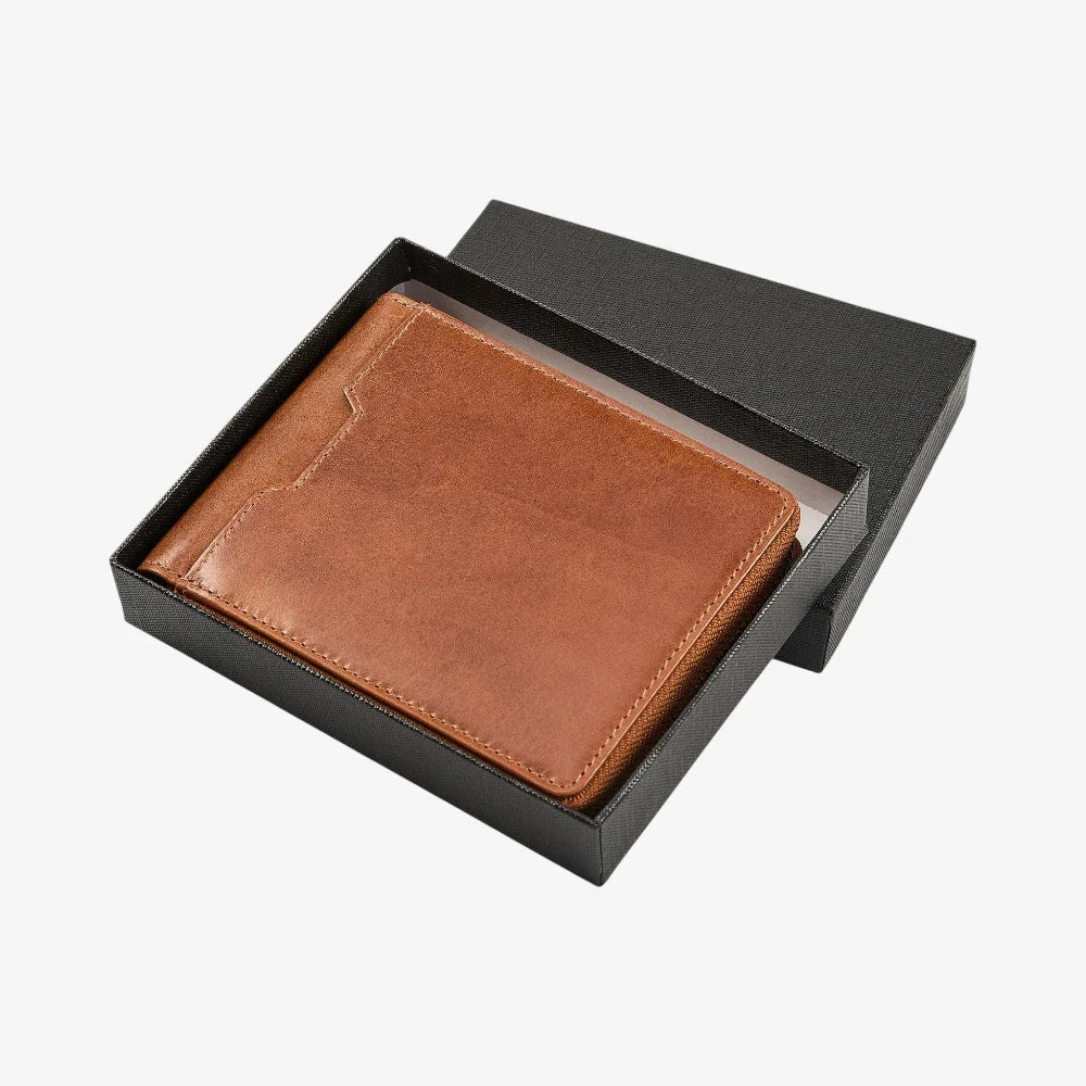 Tan leather wallet in a black box on a white background