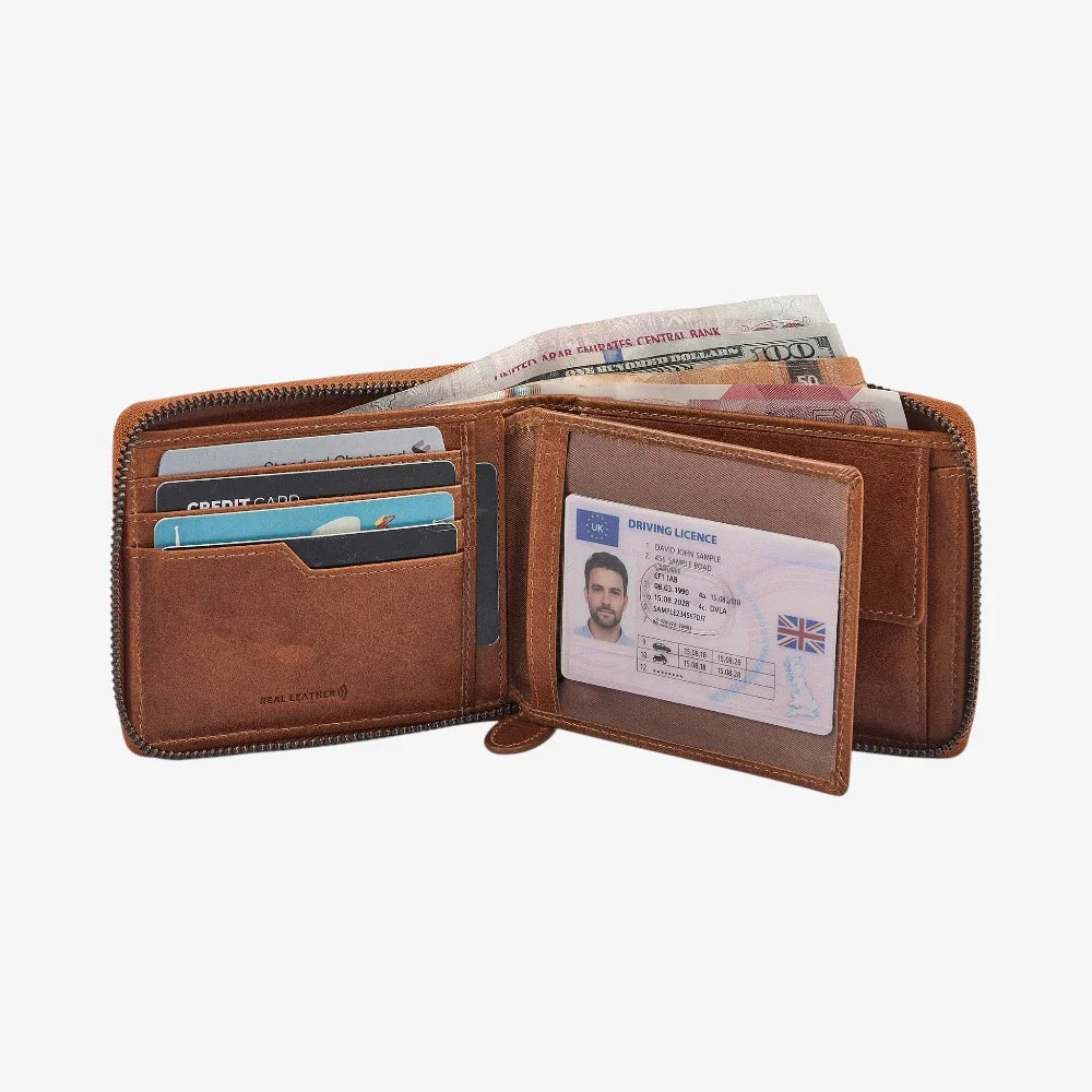 Tan leather wallet with various cards and a driver's license on a white background