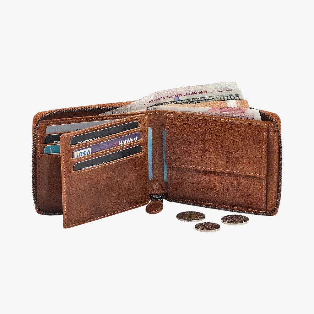 Tan leather wallet with various cards and notes on a white background